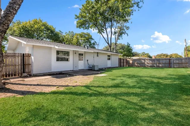 a view of a backyard with a garden