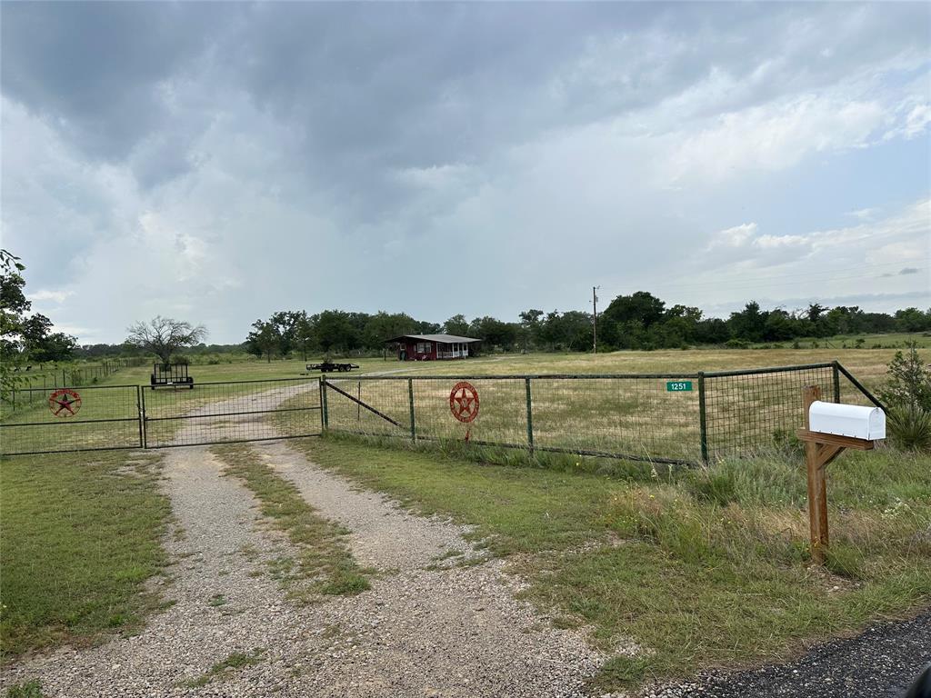 8343 County Road 270 Zephyr, TX 76890 - Photo 2 of 38 a view of a lake with houses in background