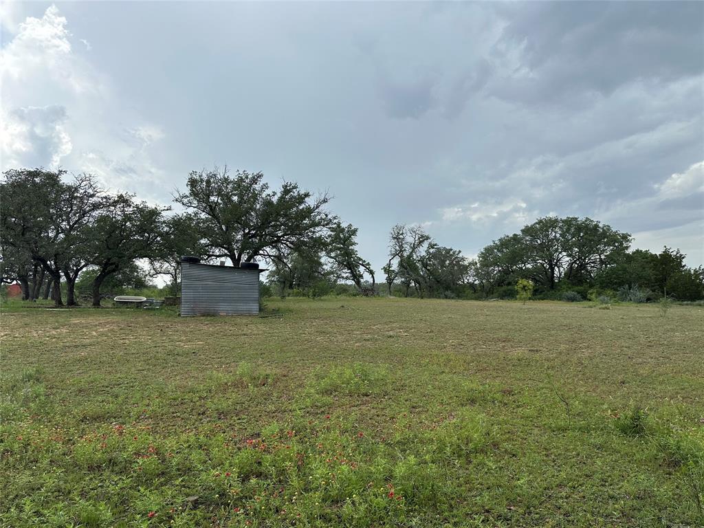 8343 County Road 270 Zephyr, TX 76890 - Photo 28 of 38 a view of an outdoor space and yard