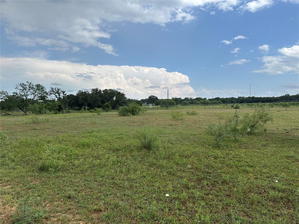 8343 County Road 270 Zephyr, TX 76890 - Photo 32 of 38 a view of a lake with a big yard