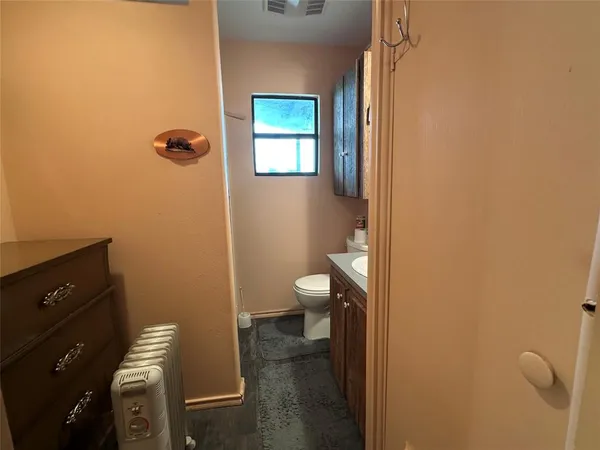 a bathroom with a toilet