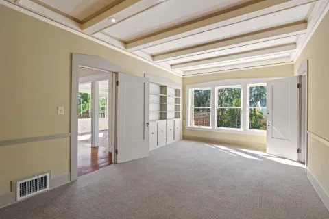 a bathroom with a sink mirror toilet and shower