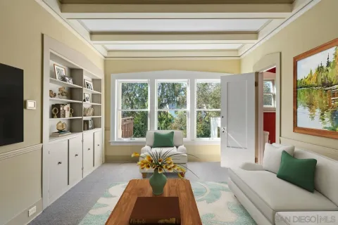 a white bath tub sitting next to a window