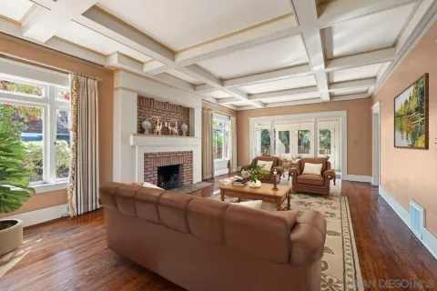 a view of a house with a wooden deck