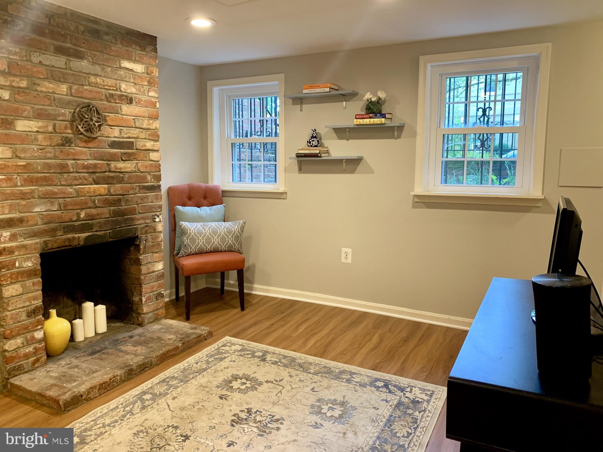 1434 A Street Southeast Washington, DC 20003 - Photo 2 of 11 Cozy retreat with rustic charm.
