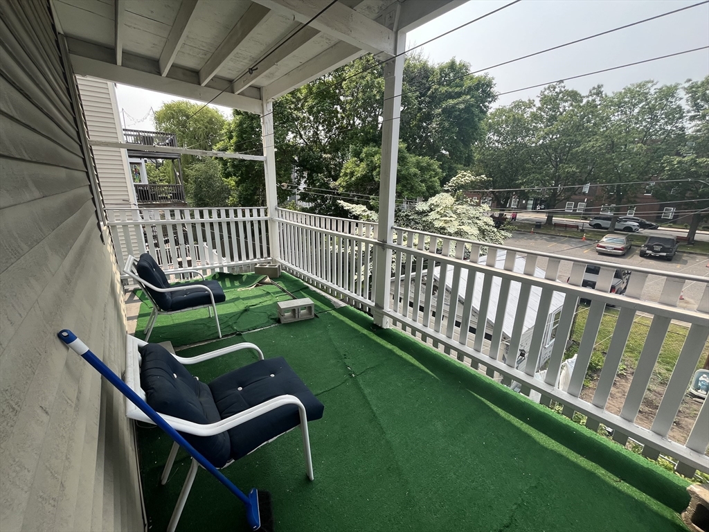 32 Howell Street, Unit 2 Boston, MA 02125 - Photo 24 of 24 a view of a chair and table in the balcony