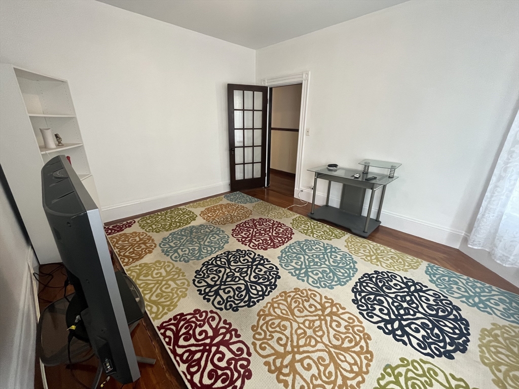 32 Howell Street, Unit 2 Boston, MA 02125 - Photo 8 of 24 a view of an entryway with a rug
