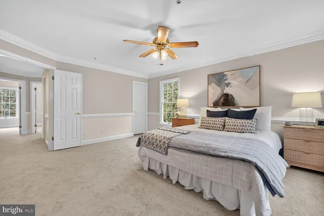 a bedroom with bed and window