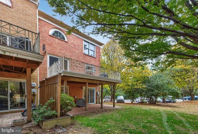 a view of a building with a yard