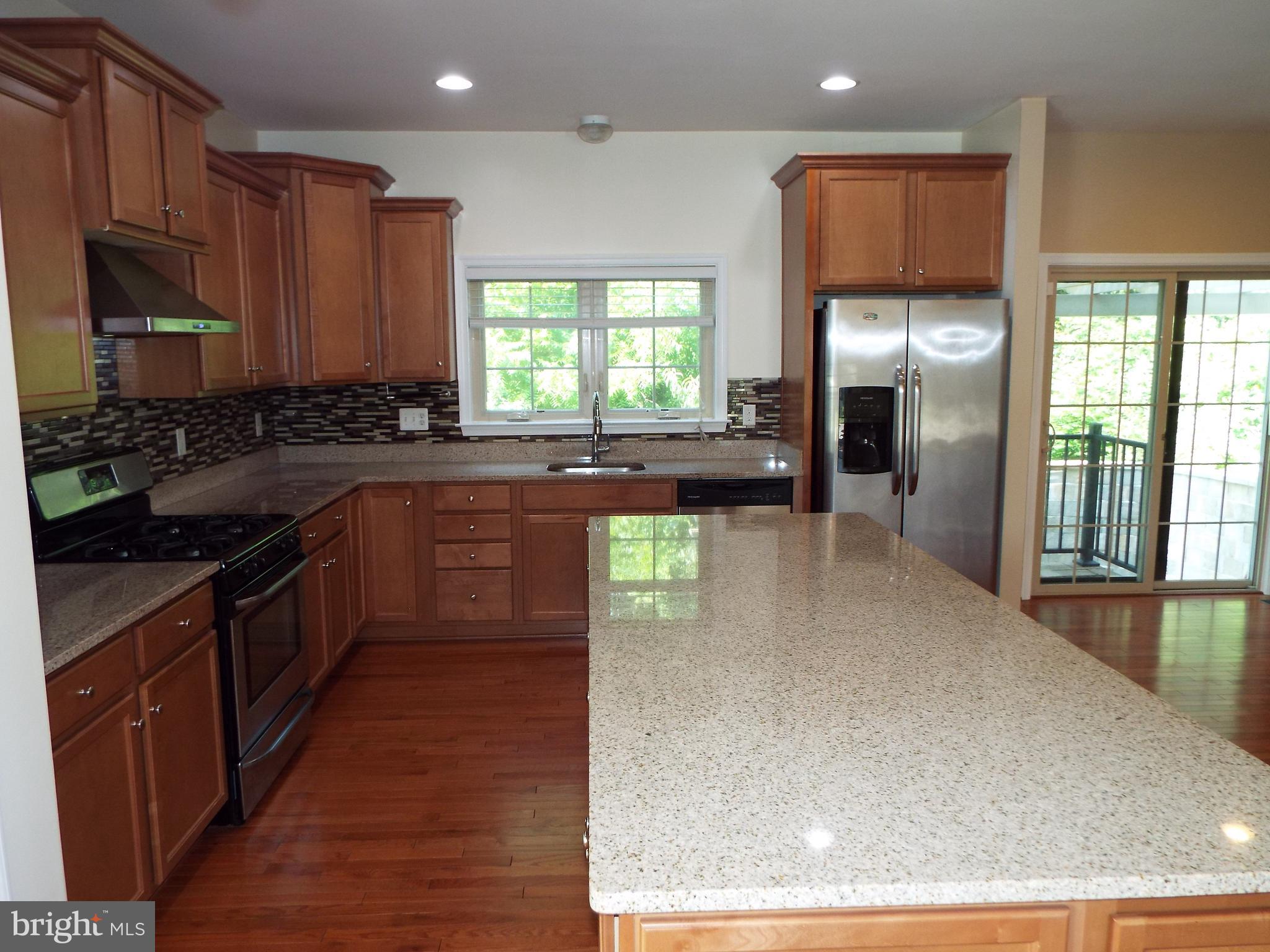 8177 Ridgely Loop Severn, MD 21144 - Photo 11 of 44 Lots of 42' Spice Maple Cabinetry
