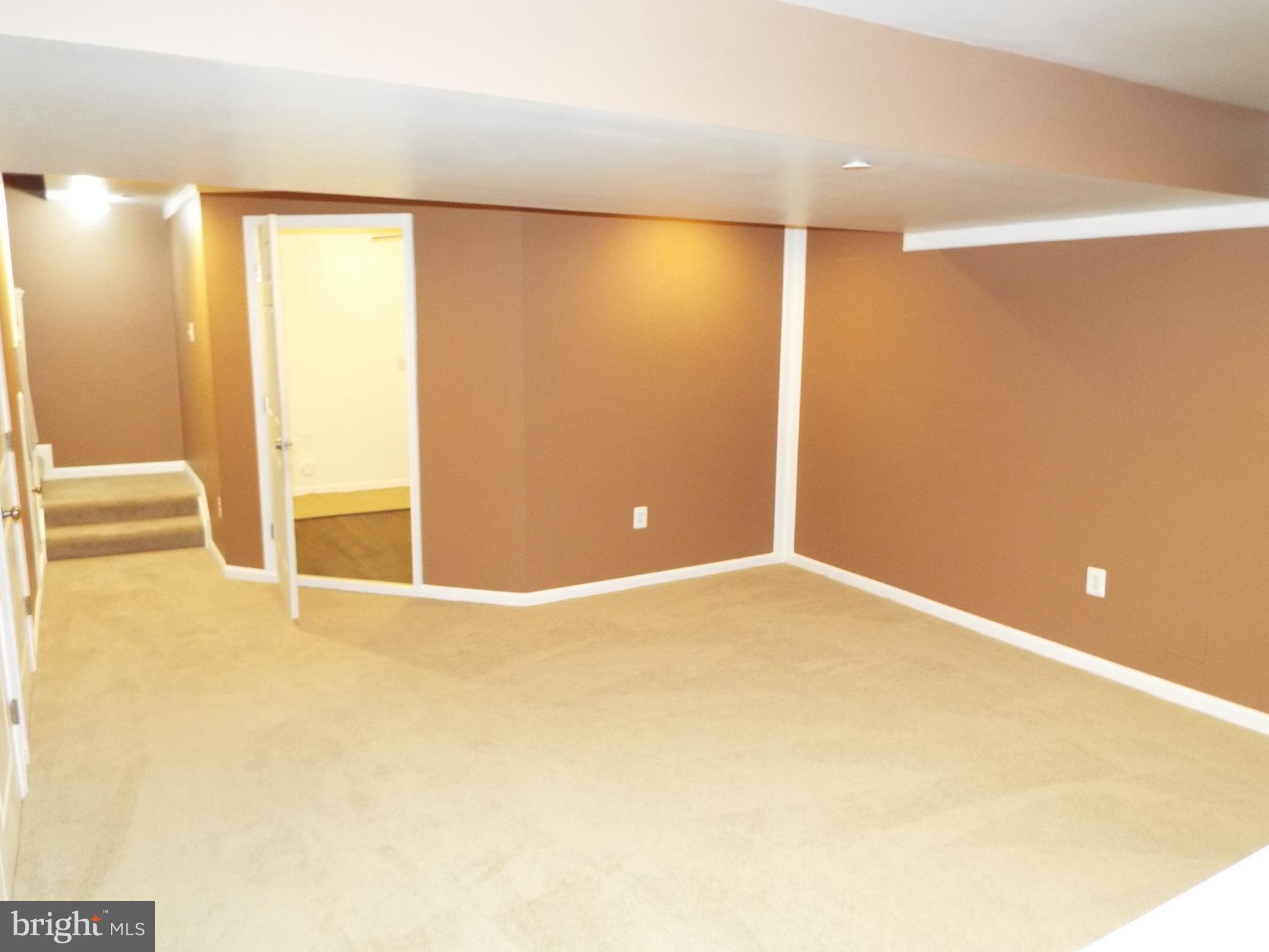 8177 Ridgely Loop Severn, MD 21144 - Photo 36 of 44 Finished Lower Level view to Hobby Room