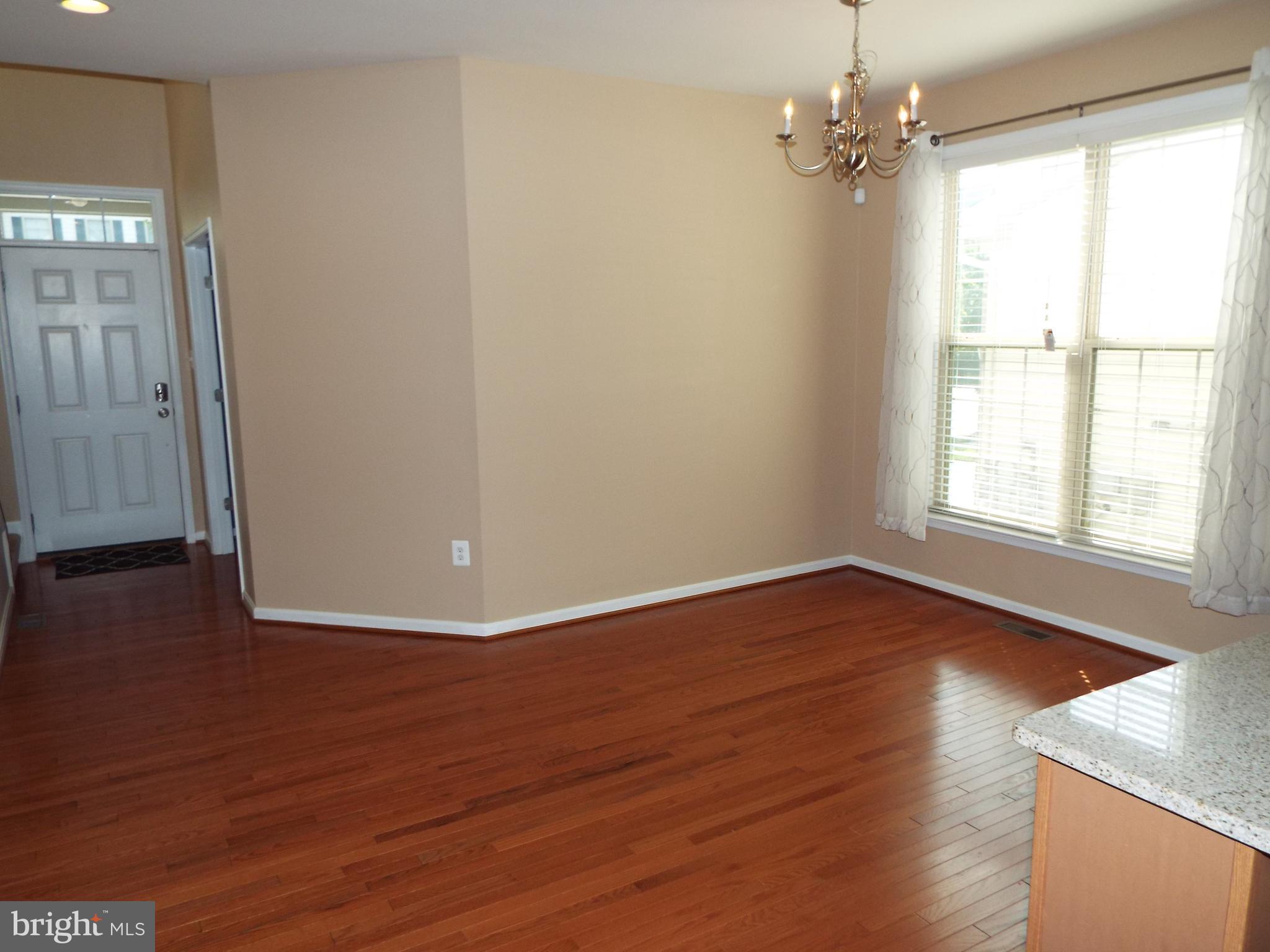 8177 Ridgely Loop Severn, MD 21144 - Photo 9 of 44 Dining Area Open to Kitchen