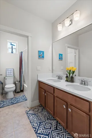 an aerial view of a residential houses with outdoor space