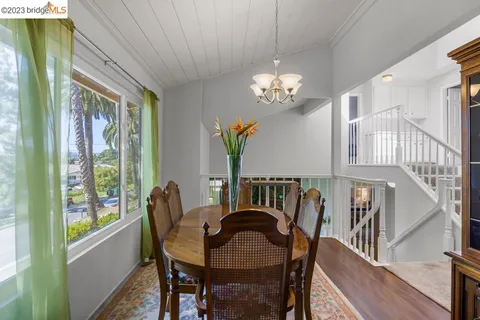 a bathroom with a wooden cabinet