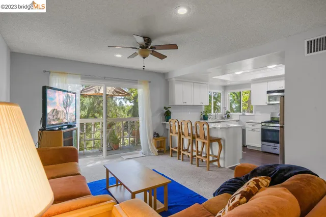 a bedroom with a bed and a lamp on table