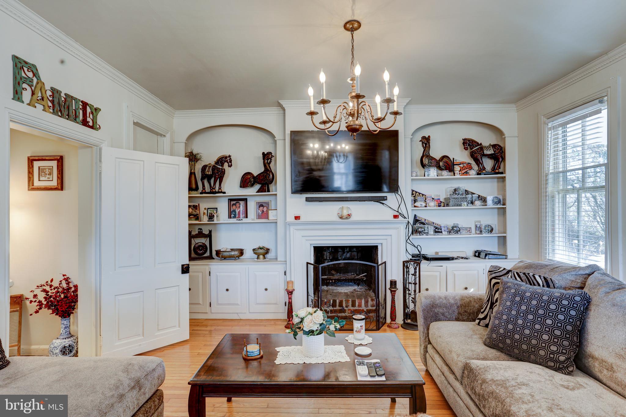 4500 Jolly Acres Road White Hall, MD 21161 - Photo 8 of 81 Built-in shelves & fireplace