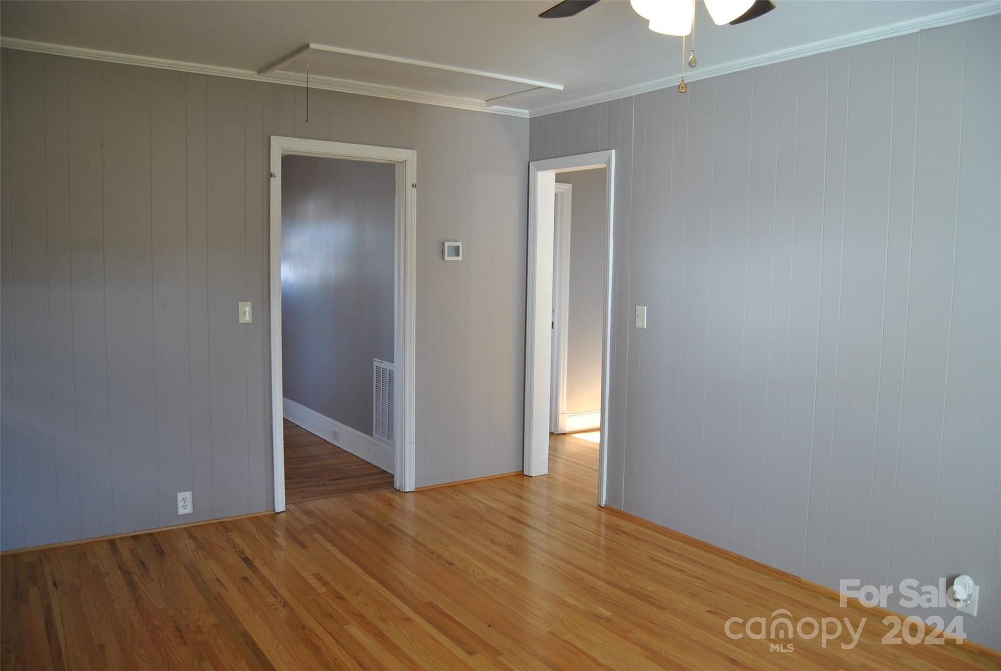 2122 Old Pageland Monroe Road Monroe, NC 28112 - Photo 11 of 24 a view of empty room with wooden floor