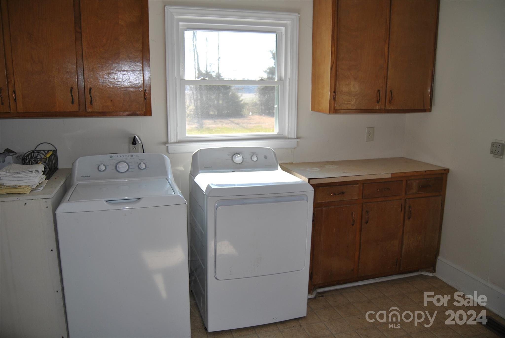 2122 Old Pageland Monroe Road Monroe, NC 28112 - Photo 13 of 24 a utility room with dryer and washer