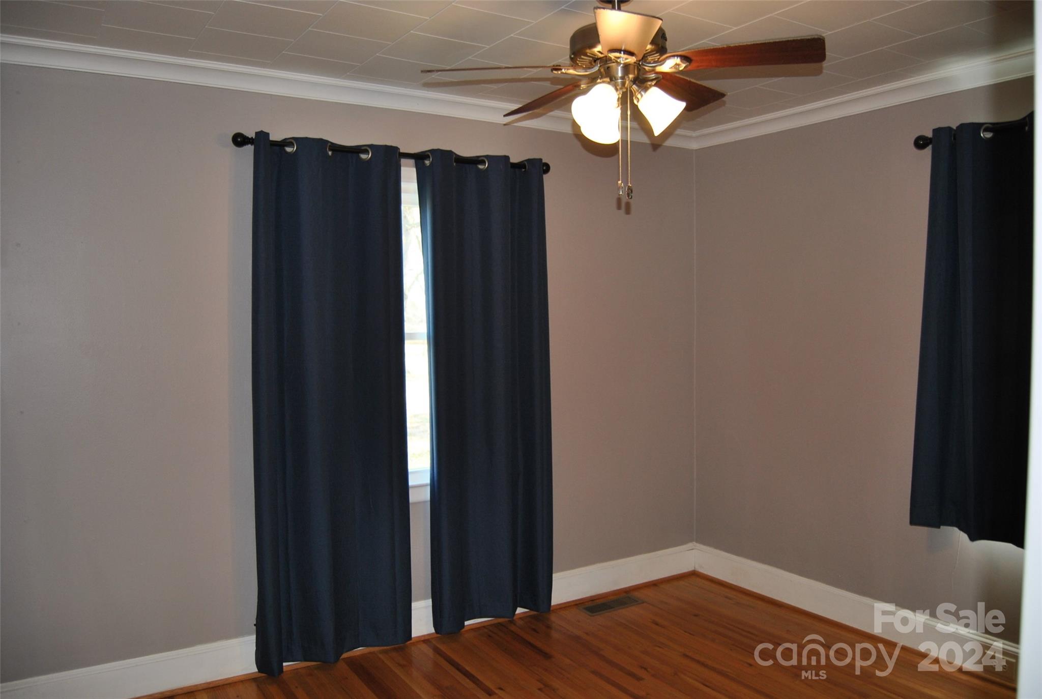 2122 Old Pageland Monroe Road Monroe, NC 28112 - Photo 5 of 24 a view of a closet with wooden floor