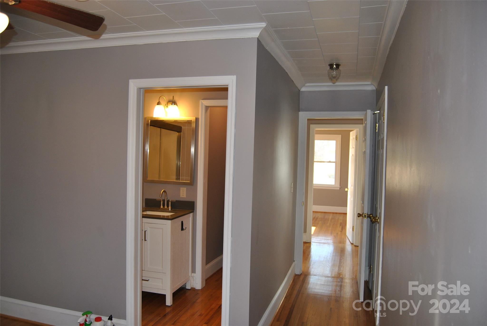 2122 Old Pageland Monroe Road Monroe, NC 28112 - Photo 8 of 24 a view of a hallway with wooden floor and closet