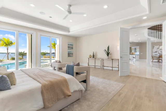 a bedroom with a bed and couch