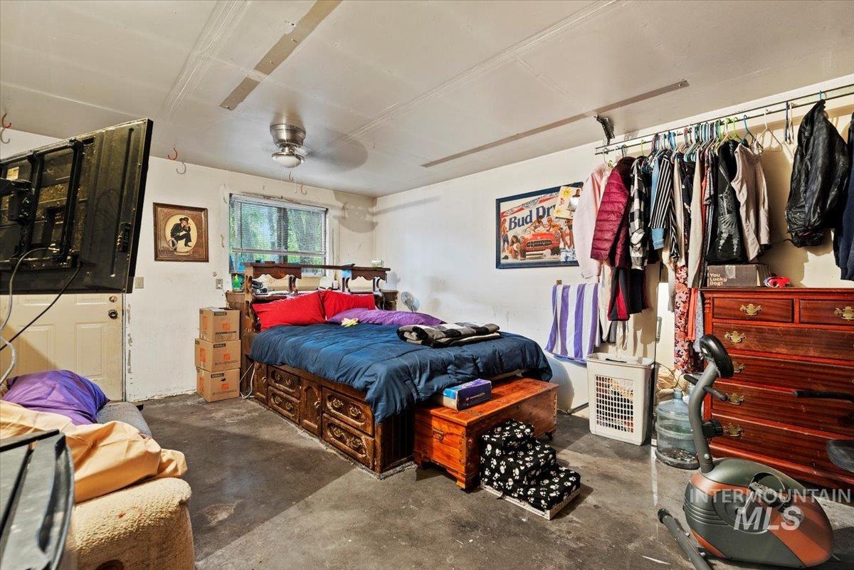 1908 South Atlantic Street Boise, ID 83705 - Photo 10 of 18 Bedroom featuring concrete flooring and ceiling fan