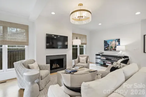 a spacious bathroom with a sink and a mirror