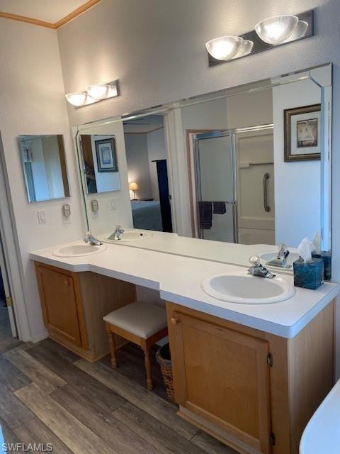298 Riverwood Road Naples, FL 34114 - Photo 26 of 39 a bathroom with a sink and a mirror