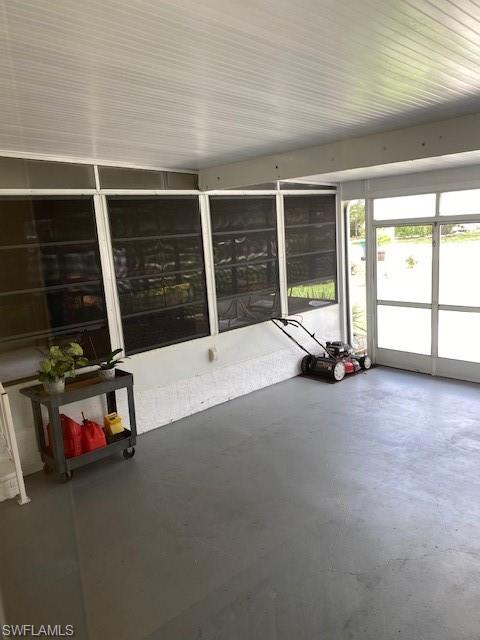 298 Riverwood Road Naples, FL 34114 - Photo 32 of 39 a view of a room with gym equipment