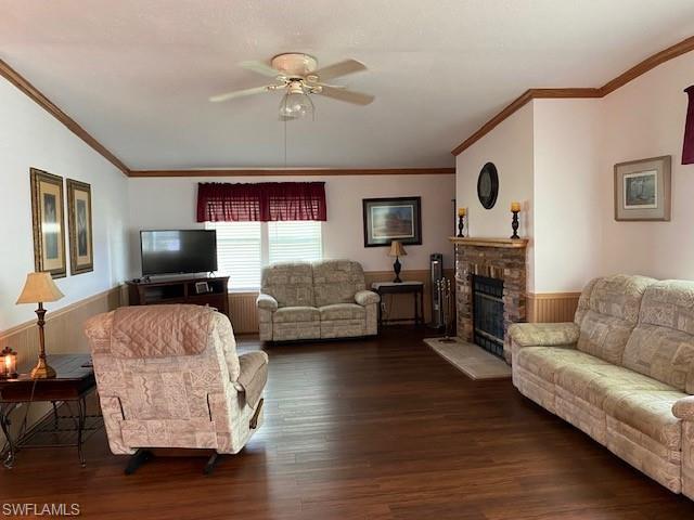 298 Riverwood Road Naples, FL 34114 - Photo 10 of 39 a living room with furniture and a flat screen tv