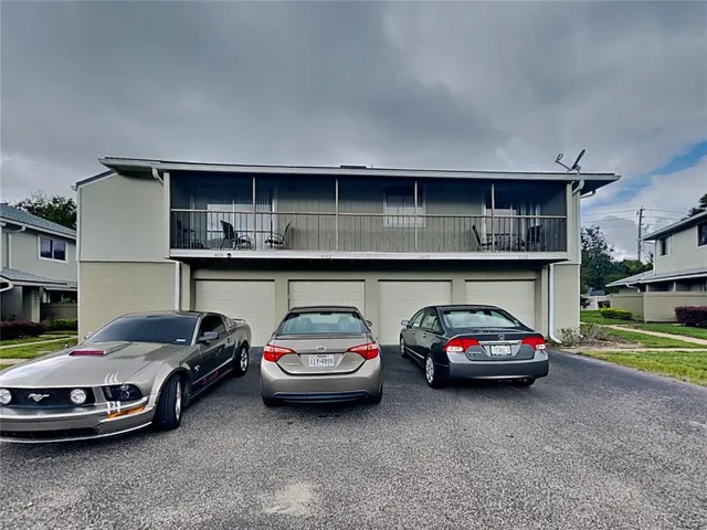 a view of a cars parked in garage