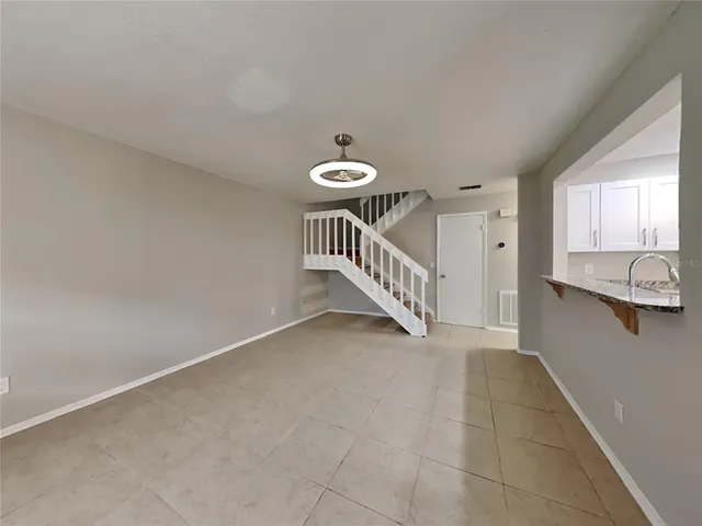 a view of a hallway with closet