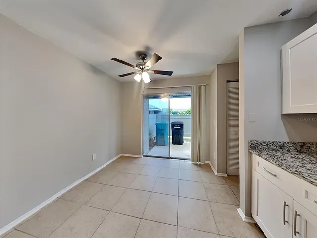 wooden floor in an empty room with a mirror