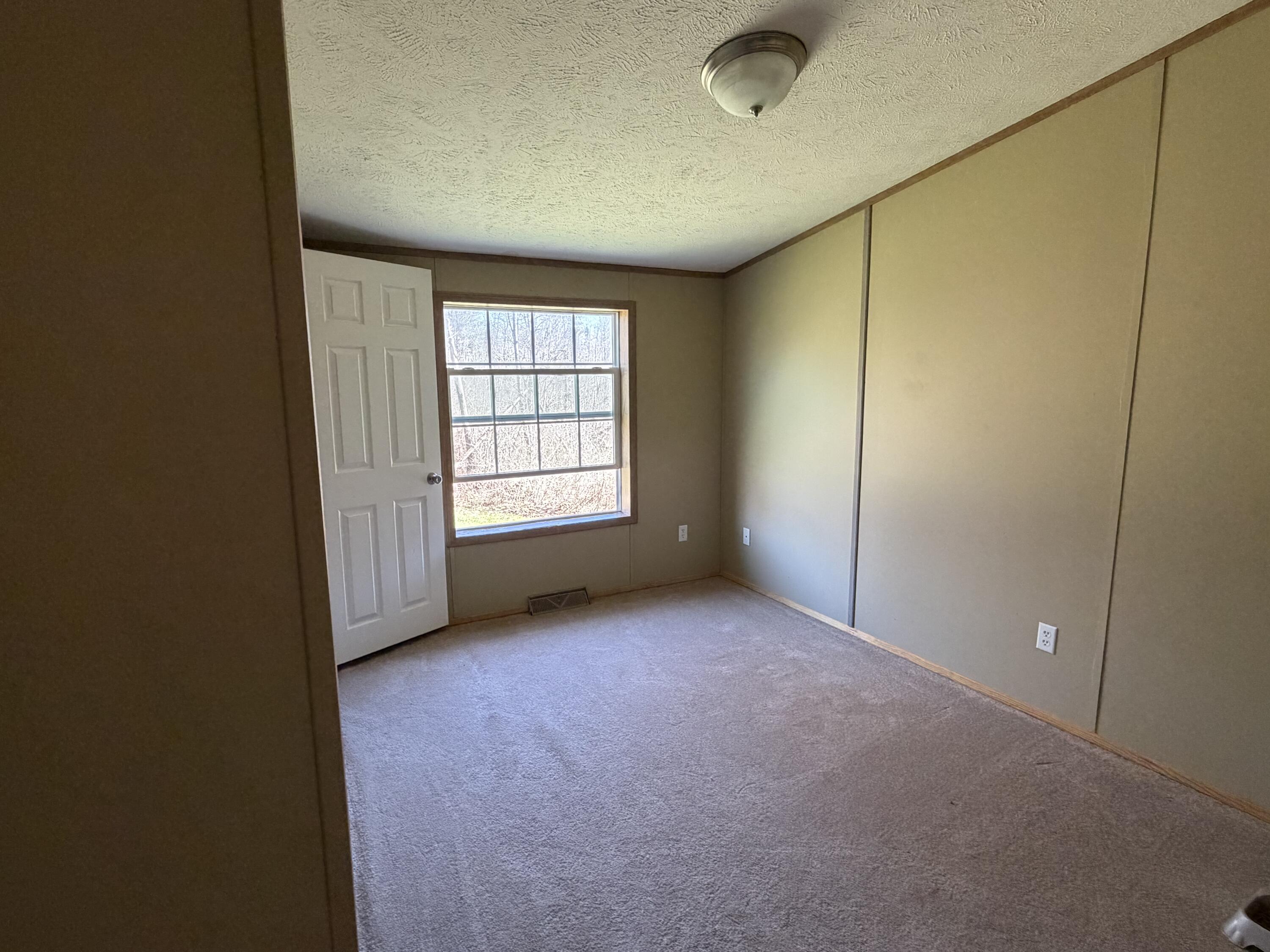51 Palmer Road Unity, ME 04988 - Photo 13 of 16 spare room 2