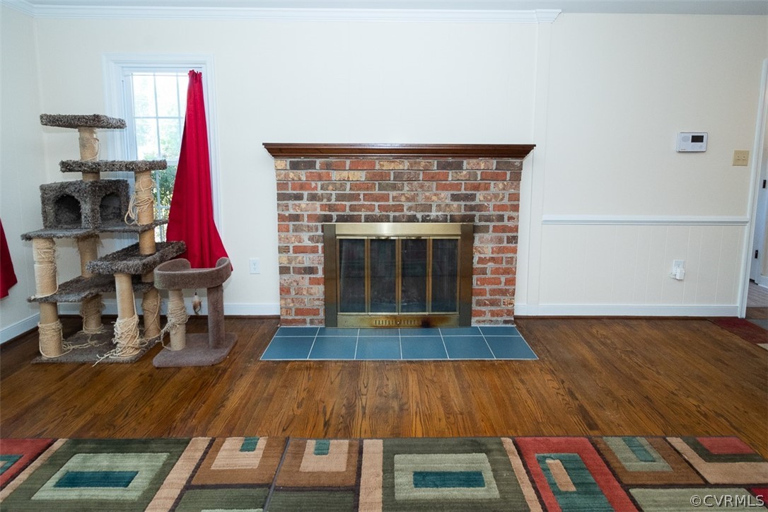 7110 Barkbridge Road Chesterfield, VA 23832 - Photo 12 of 34 a living room with furniture and a fireplace