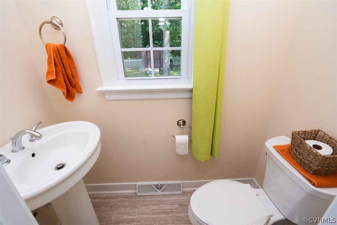 7110 Barkbridge Road Chesterfield, VA 23832 - Photo 16 of 34 a bathroom with a sink and a toilet