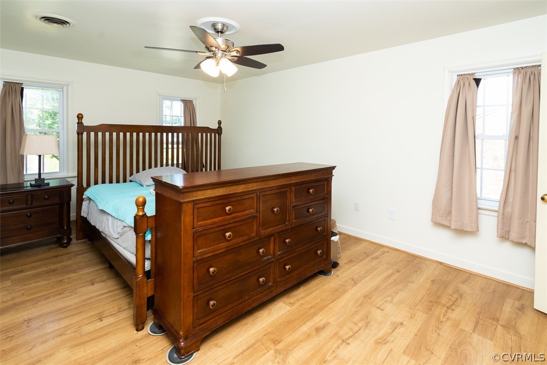 7110 Barkbridge Road Chesterfield, VA 23832 - Photo 18 of 34 a bedroom with a bed and a window