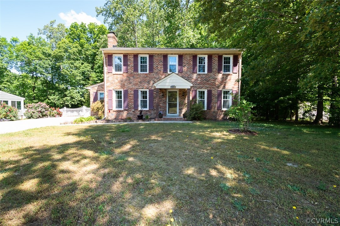 7110 Barkbridge Road Chesterfield, VA 23832 - Photo 2 of 34 a front view of a house with a yard