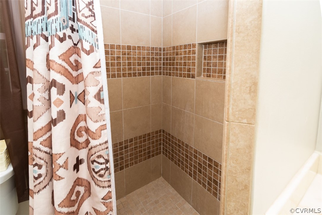 7110 Barkbridge Road Chesterfield, VA 23832 - Photo 21 of 34 a bathroom with a shower