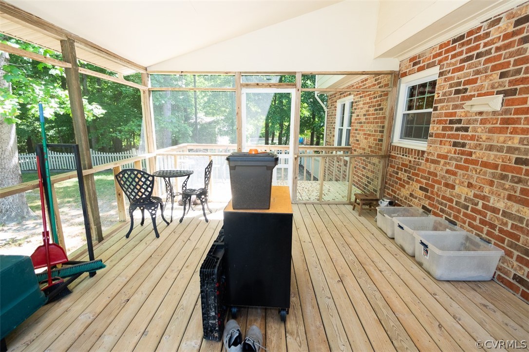 7110 Barkbridge Road Chesterfield, VA 23832 - Photo 27 of 34 a view of a balcony with chairs and wooden floor