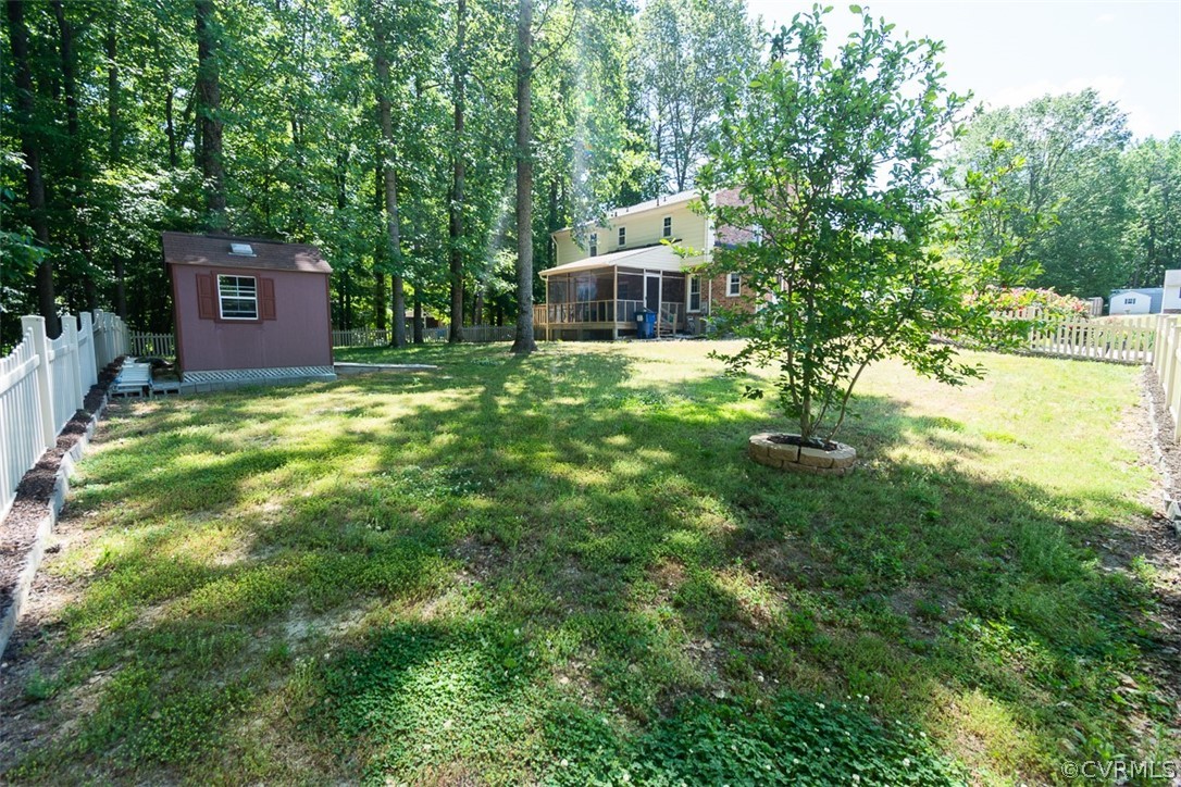 7110 Barkbridge Road Chesterfield, VA 23832 - Photo 30 of 34 a backyard of a house with table and chairs