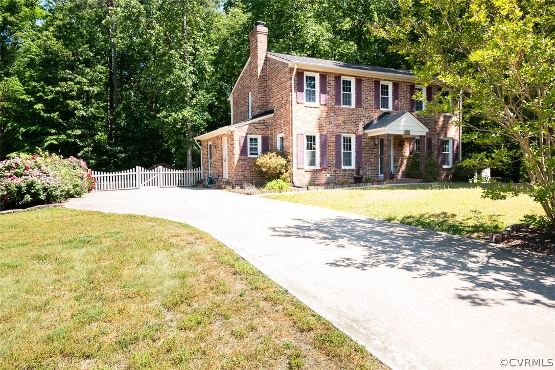 7110 Barkbridge Road Chesterfield, VA 23832 - Photo 3 of 34 a front view of a house with swimming pool
