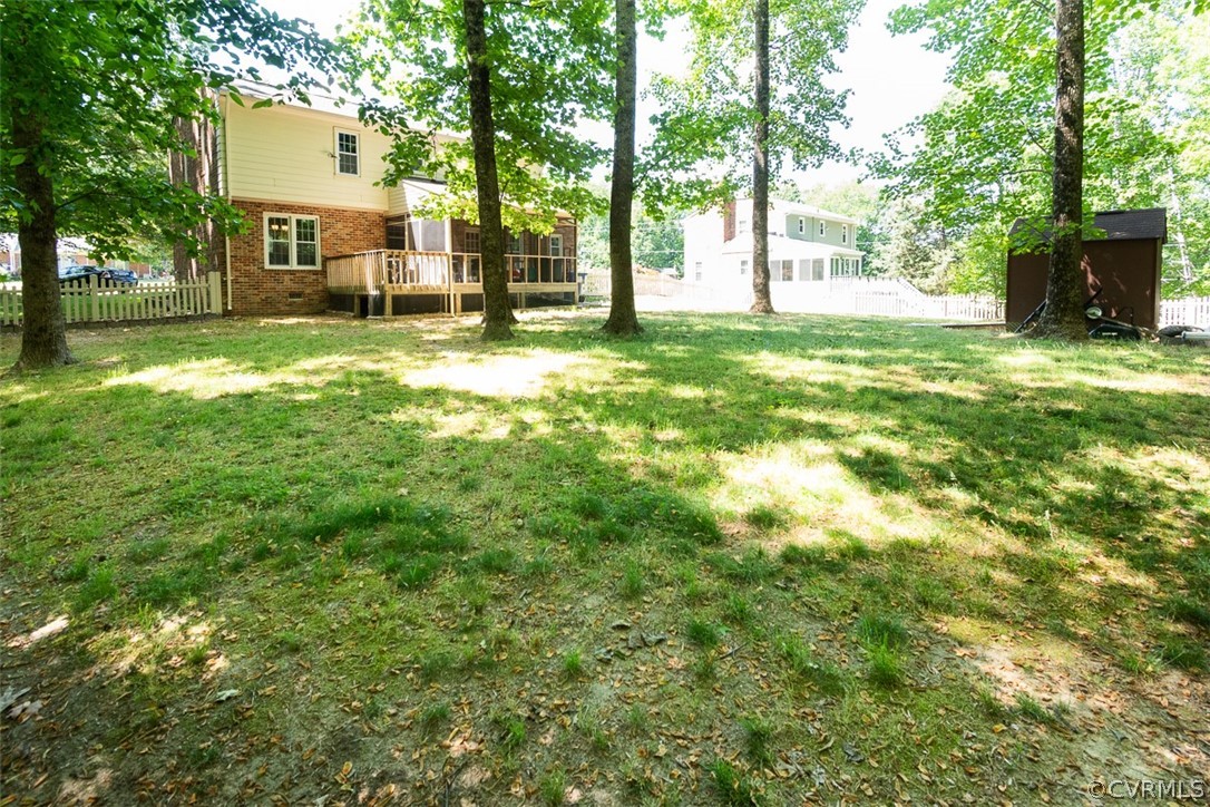 7110 Barkbridge Road Chesterfield, VA 23832 - Photo 32 of 34 a view of a yard with plants and large trees