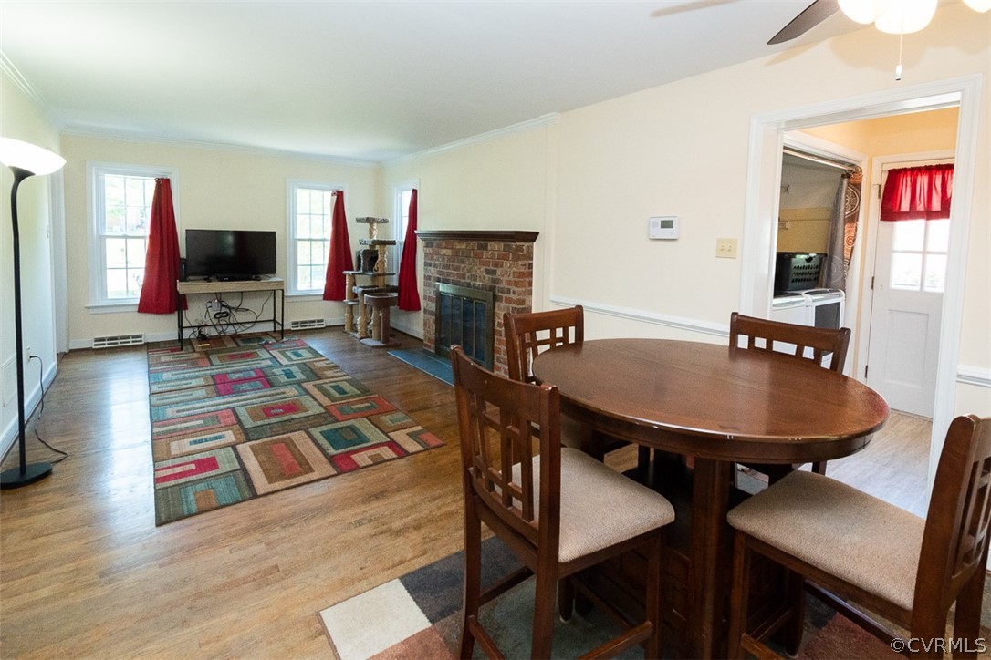 7110 Barkbridge Road Chesterfield, VA 23832 - Photo 10 of 34 a living room with furniture and a wooden floor