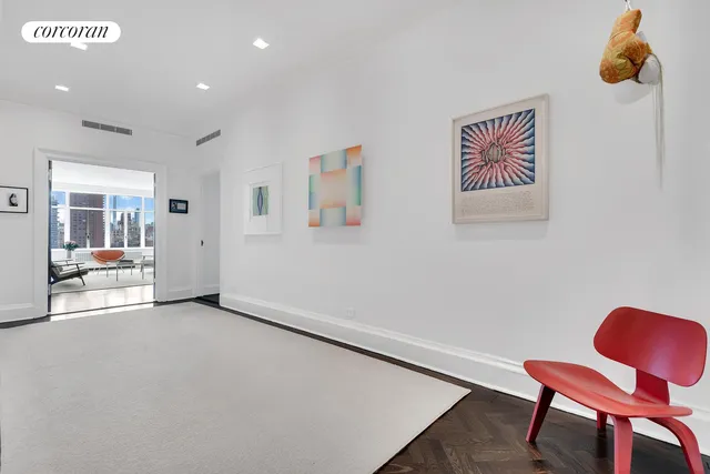 a view of living room with furniture and flat screen tv
