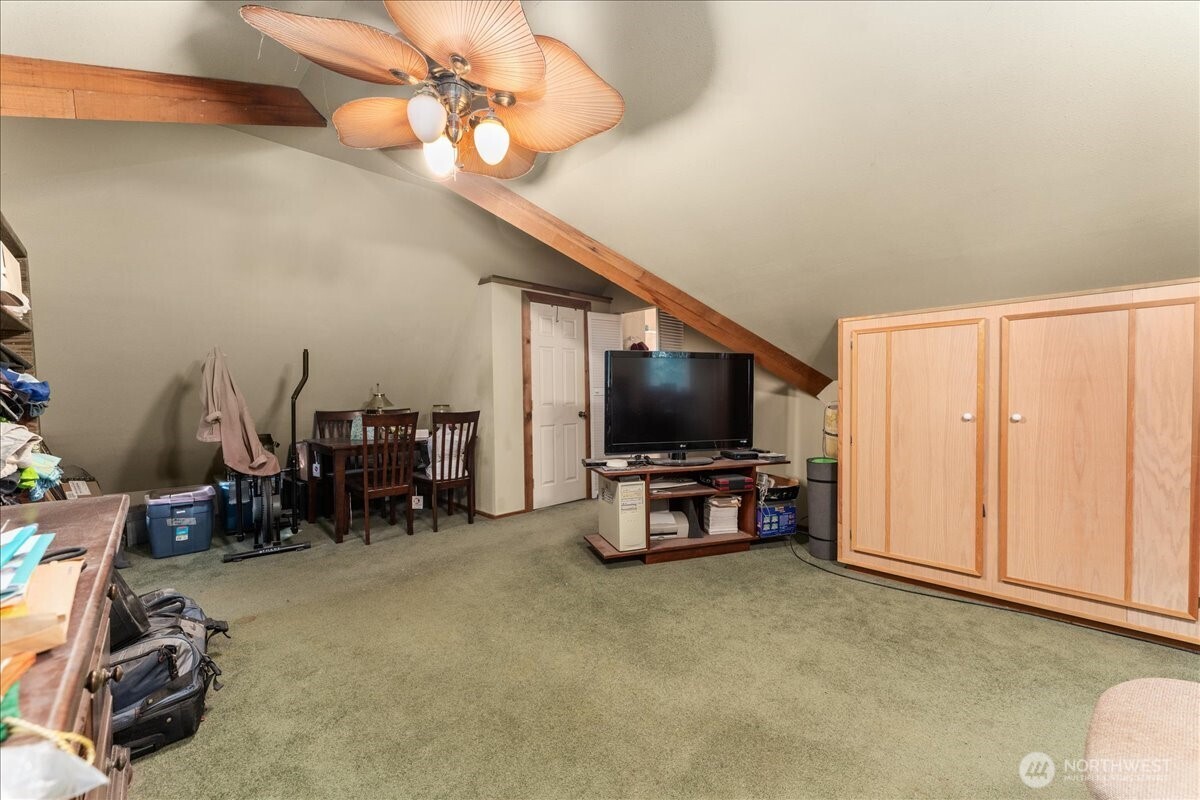 19095 Gill Creek Road Leavenworth, WA 98826 - Photo 14 of 30 a view of a livingroom with furniture and a flat screen tv
