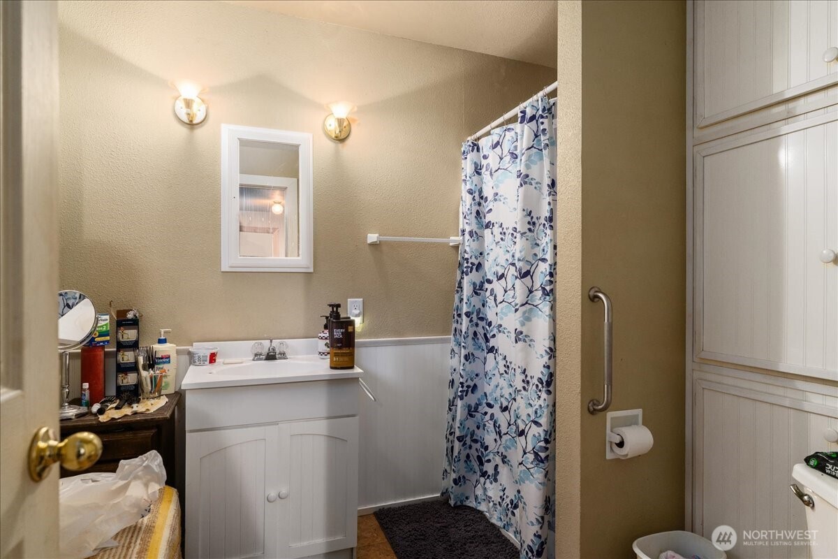 19095 Gill Creek Road Leavenworth, WA 98826 - Photo 18 of 30 a room that has a lot of storage space and a window