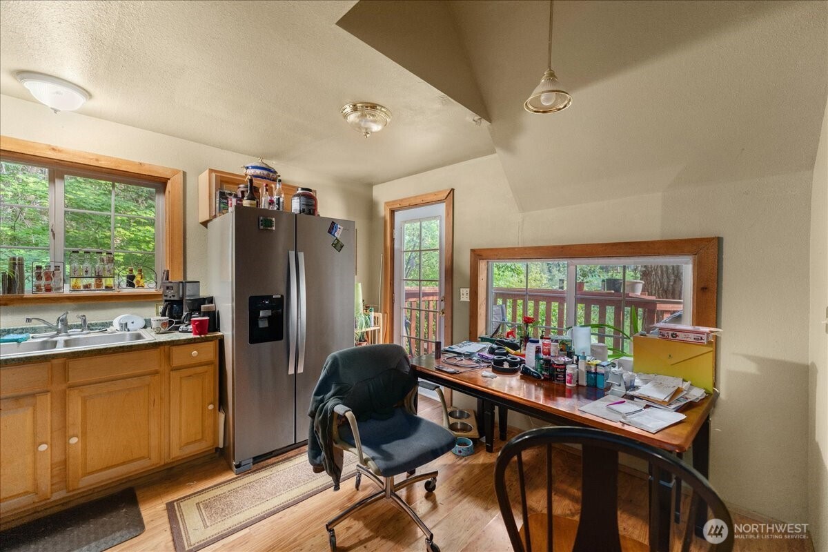 19095 Gill Creek Road Leavenworth, WA 98826 - Photo 10 of 30 a view of a dining room with furniture window and outside view