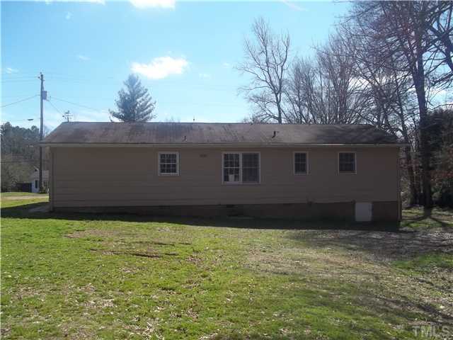 3261 Virgilina Road Roxboro, NC 27574 - Photo 6 of 9 a view of a backyard