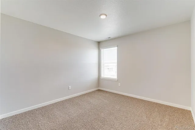 a bathroom with a sink double vanity granite tub shower and a mirror